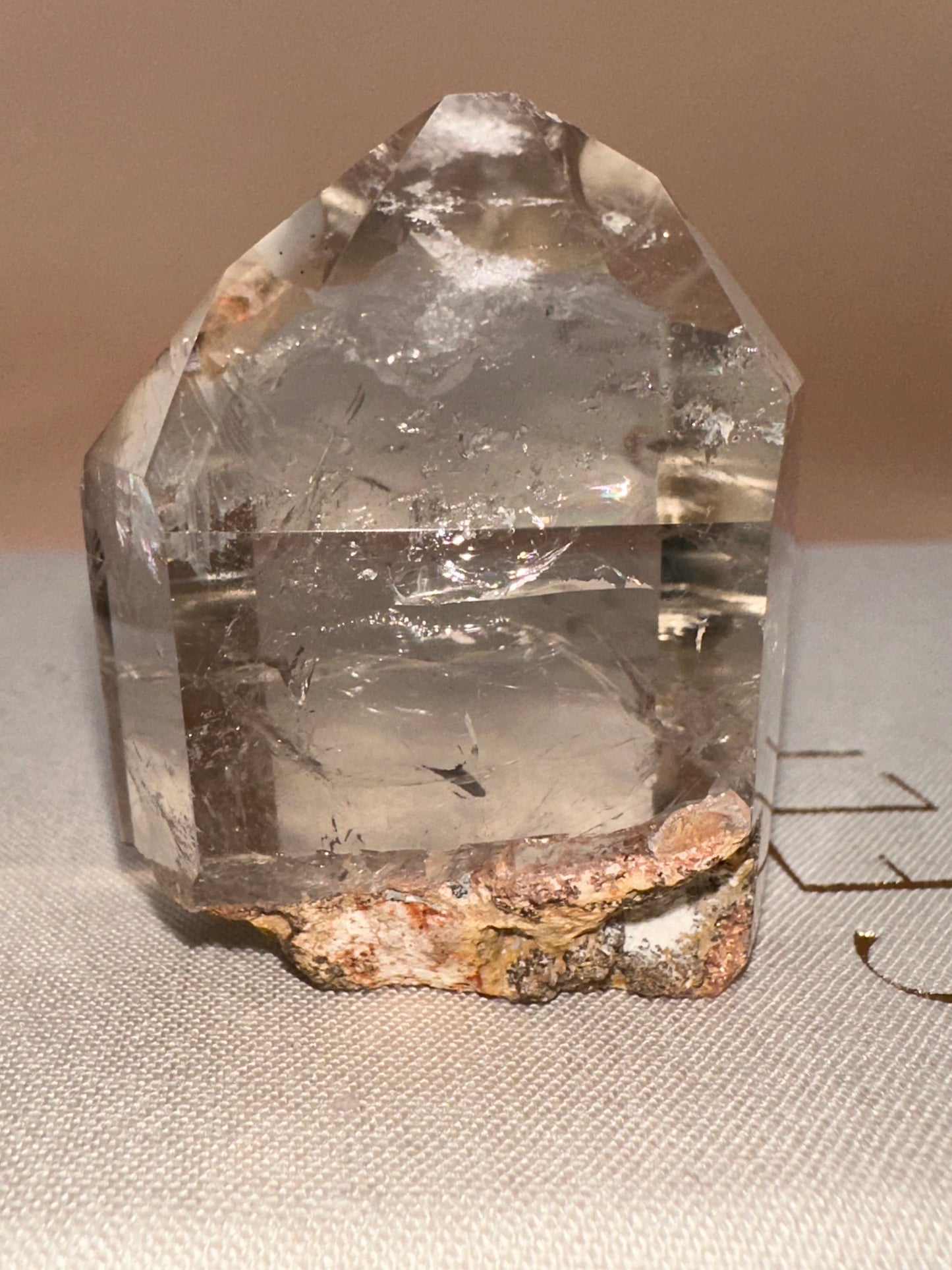 Pink Lodalite Part Raw Part Polished