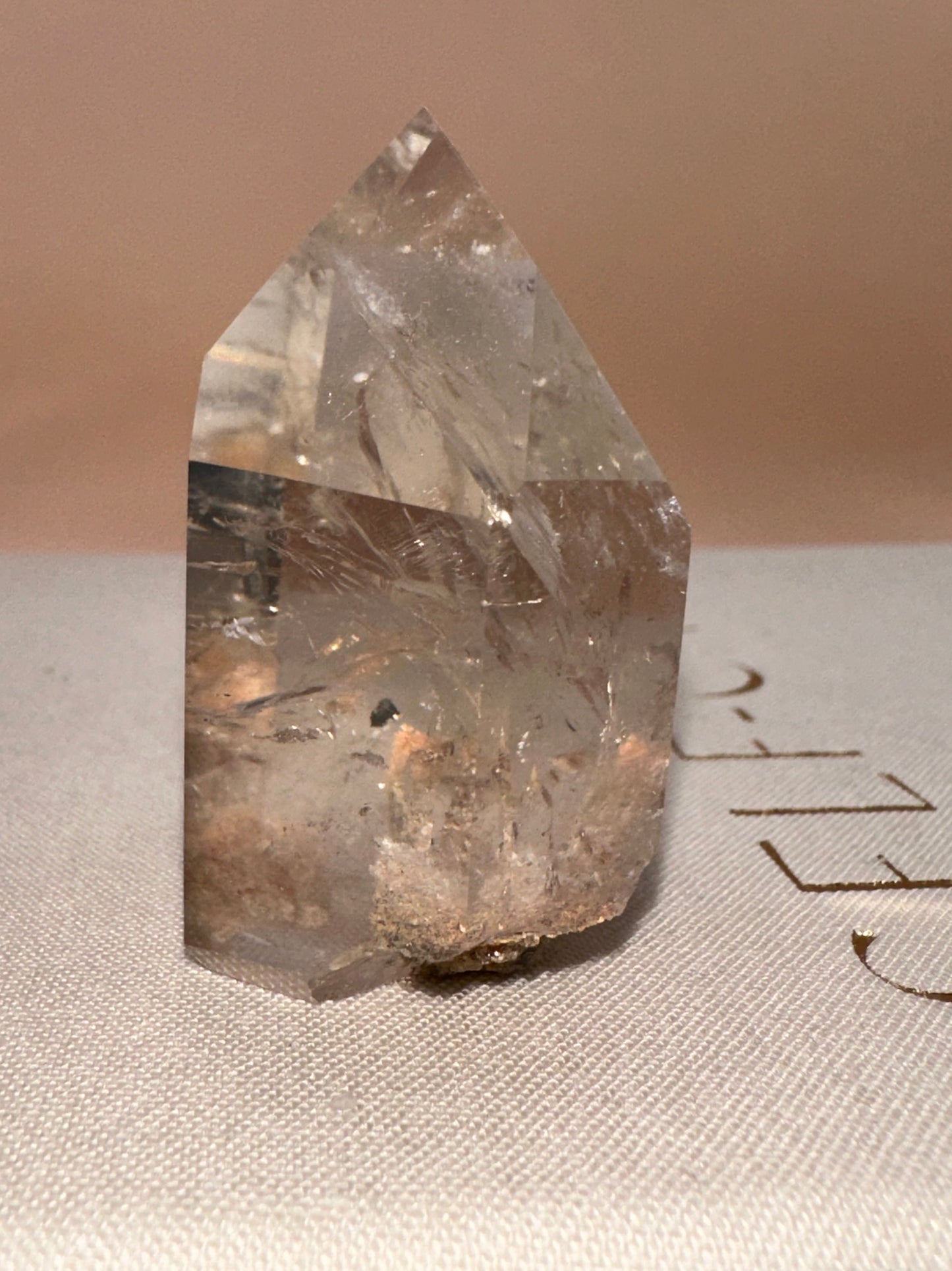 Pink Lodalite Part Raw Part Polished