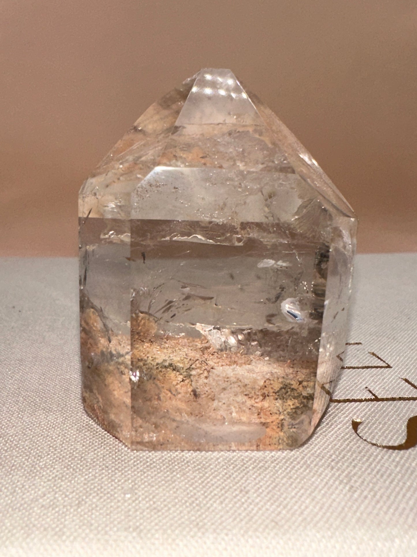 Pink Lodalite Part Raw Part Polished