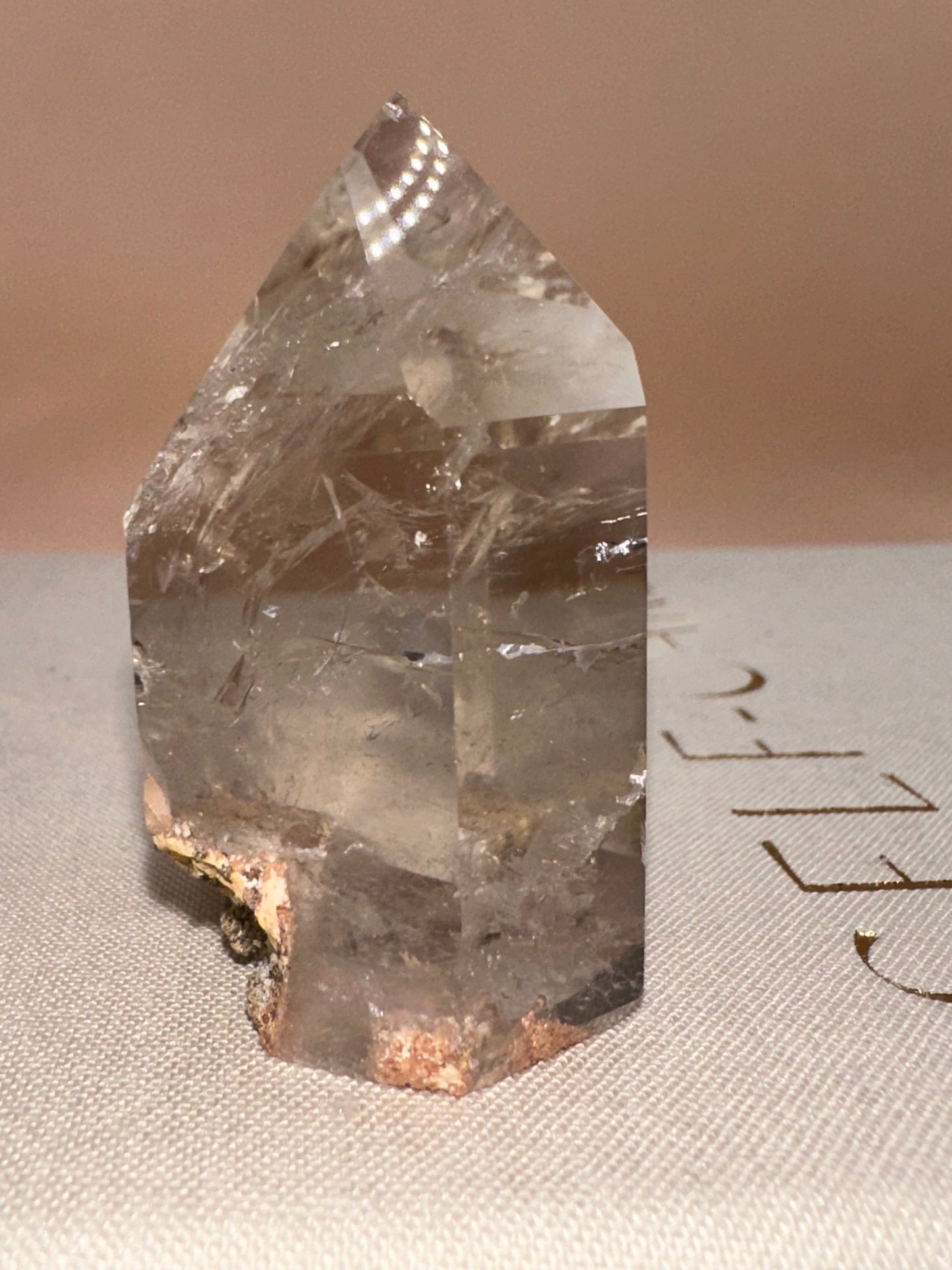 Pink Lodalite Part Raw Part Polished